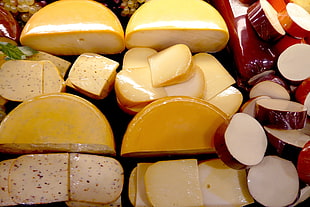 sliced cheese lot HD wallpaper